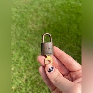 Louis Vuitton Authentic Gold Lock and key number 303